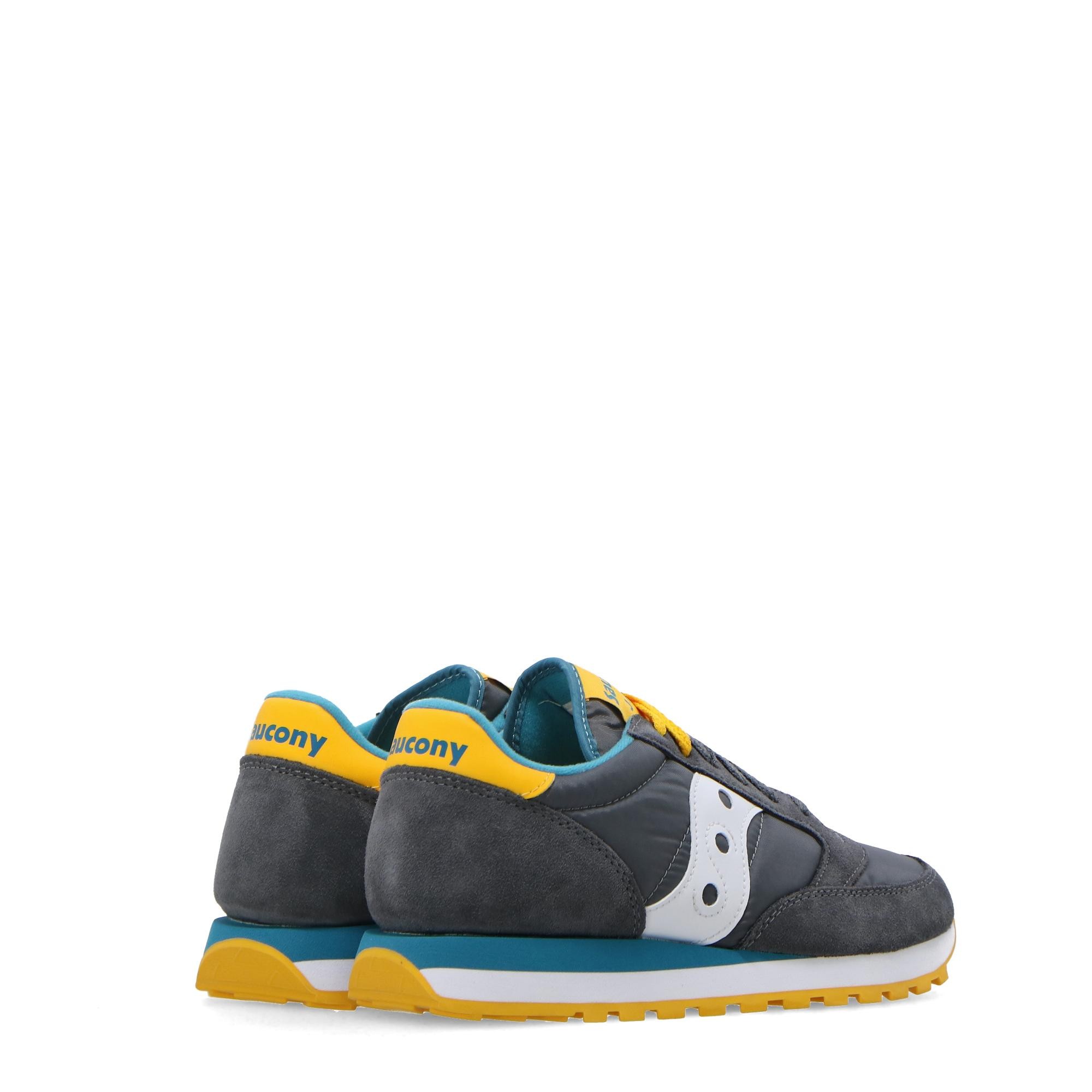 saucony shadow uomo oro
